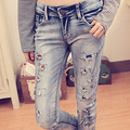 2012秋冬新款 磨白做旧破洞贴布显瘦牛仔裤 小脚裤女