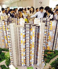 现在手上有3套按揭的房子,要把30万装修款拿去再买一套么