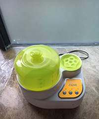 新贝奶瓶消毒加热2合1