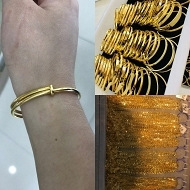 这里的黄金称斤数卖?