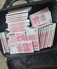 欲买24万高仿假钞,结果被人用银行点钞纸骗走5万