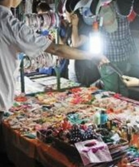 ����������ȥ�ڵ�̯�����Ǿ������Ӳ�Ʒ������