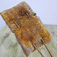 这家苕皮烤得又焦又泡