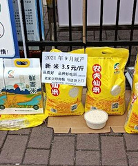 元旦前被裁员,干起了摆摊卖米的活