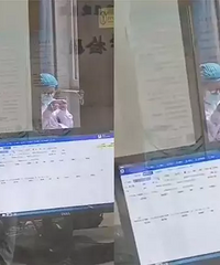 孩子发烧取化验单护士低头玩手机