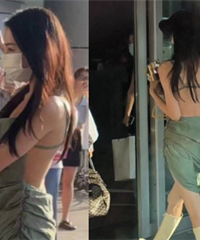 热巴露背装现身机场,好性感
