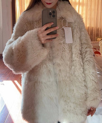 终于买到好的托卡外套了!毛很自然,品质不错
