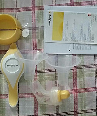 熊吸奶器坏了,奶又涨的很了临时在孩子王买