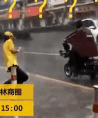 卖猪肉小哥暴雨中大跳机械舞:雨中跳更浪漫