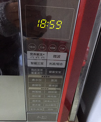 ���������΢��¯�йⲨ��ť����������һ�������������