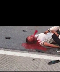 ������ɽ�������һ���ƿ����Ħ�г���ײ�¹� �ֳ���Ѫ�ȣ�