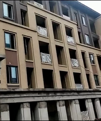 һ�󲨸����ͼ��Ϯ���Ƽ���ĳ¥������ǰ�ع�...