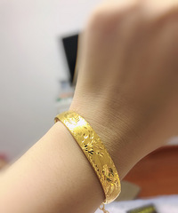 当时265元每克的金价 7300元拿下近25克的手镯