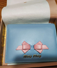 miumiu������Ǯ���ͼ�ת