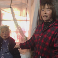 �Ϻ��У�̨��89�갢����ˮ����һ�ߣ�������Ӿ������һ������