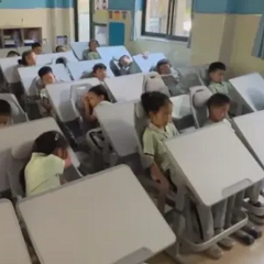 “统一采购，不需家长花钱”，杭州多所小学更换躺睡椅