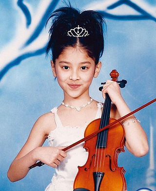 2013港姐陈凯琳整容平胸是非不断 童年照曝光